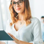 Business woman in white shirt